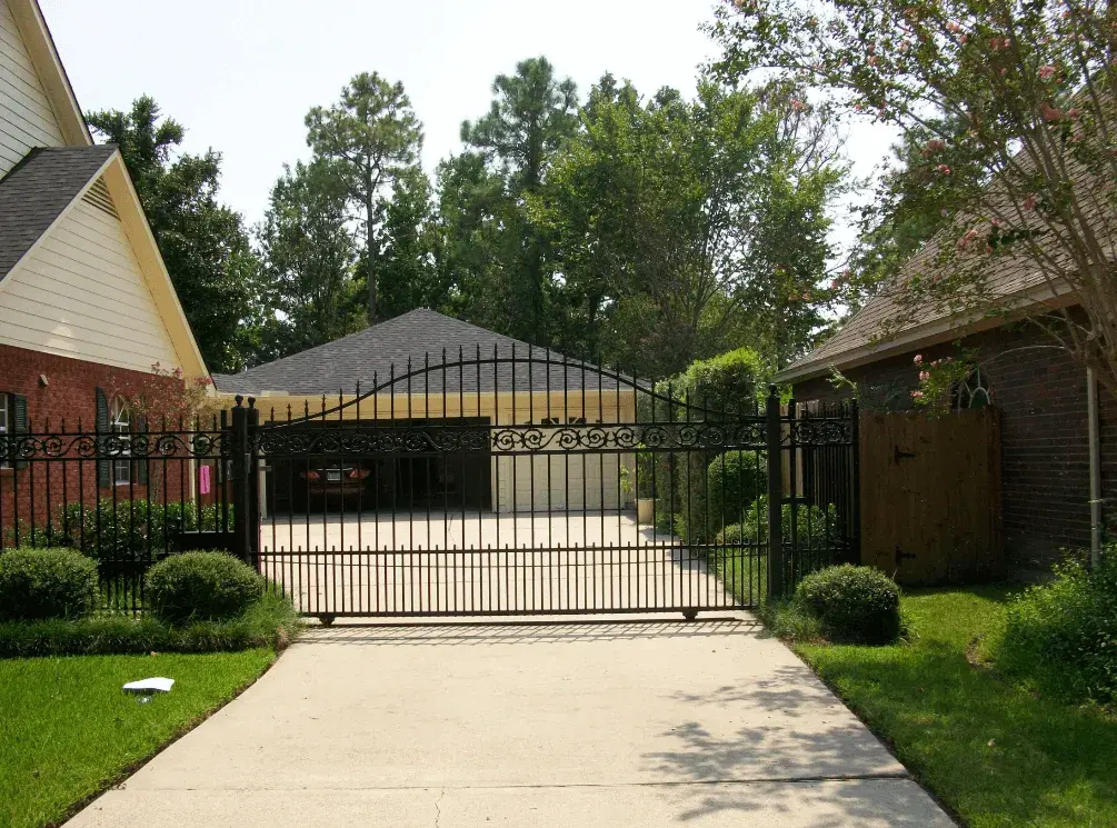 Comparing Aesthetic Qualities of Wood, Iron, Steel, Aluminum, and Glass Driveway Gates