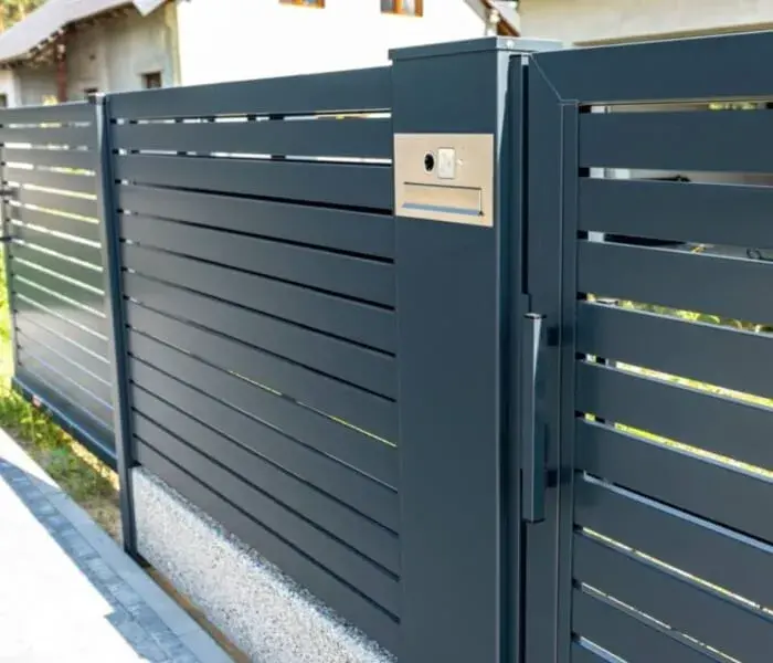 How Different Materials Influence Driveway Gate Aesthetics: Wood, Iron, Steel, Aluminum, and Glass